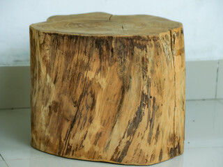 Rustic Wooden Stump Brown Tabletop on Tiled Floor