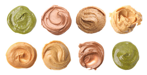 Smooth and velvety food texture. Spreads of different nuts isolated on white, set. Top view