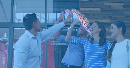 Group of coworkers noticing pulsing digital globe celebrating success with five-person high-fiving - Powered by Adobe