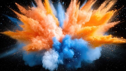 Explosive cloud of orange and blue powder on black