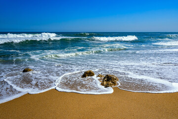 Breaking waves panorama at Matosinhos beach near Porto in Portugal. Surf with spray, splashes, and...