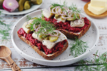 Scandinavian sandwiches with herring and beetroot	