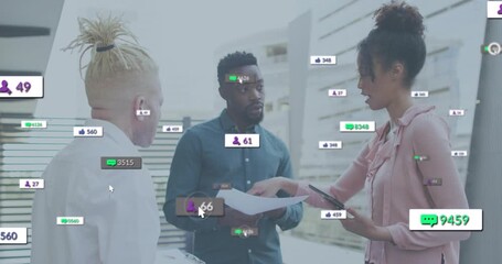Team reviewing docs and gesturing at tablet while floating social media metrics boosting engagement - Powered by Adobe