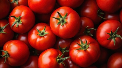 Fresh red tomatoes stacked closely together, showcasing their vibrant color and natural freshness, perfect for culinary uses and healthy eating.