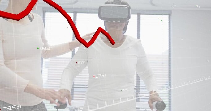 Therapist presenting VR headset to patient holding bars and walking while animating rehab metrics