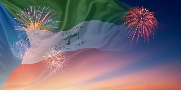 Waving National flags of Equatorial Guinea In sky with fireworks and text
