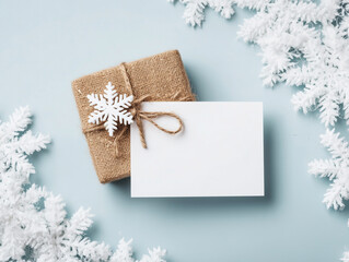 Create a festive Christmas card mockup with snowflakes and a rustic gift box for holiday cheer