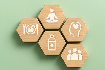 Wooden hexagons representing pillars of health and wellness
