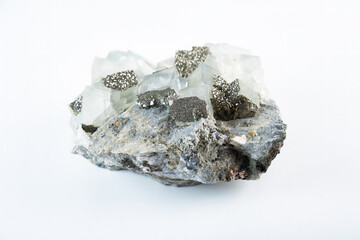 Fluorite mineral stone with cubic crystals and pyrite inclusions, a natural calcium fluoride...