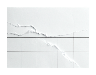 Close-up of torn white paper, revealing texture and grid lines