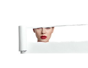 Woman's face peeks through torn paper against a black background