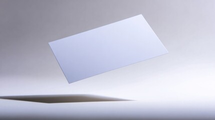 A sleek blue rectangle floats midair against a light gray gradient backdrop,