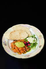Gourmet salmon tartare with guacamole and bread