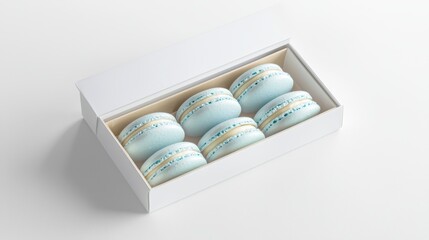 Box of coconut macaroons in white box isolated on light background. Macaroons background. Famous French dessert