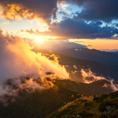 Fototapeta premium Vibrant sunset over mountainous terrain, clouds illuminated with warm, golden light