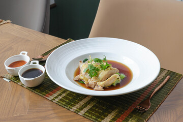 Exquisite Culinary Art: A delectable dish of tender chicken, presented with artistry and flavor,...