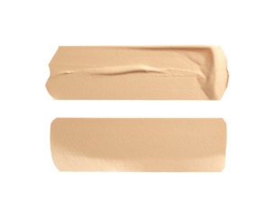 Two rectangular swatches of beige cosmetic product on a black background