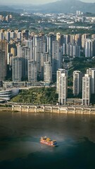 Fototapeta premium Chongqing Modern Cityscape with Traditional Passenger Boat on Yangtze River and Urban Skyscrapers Along Mountainous Landscape
