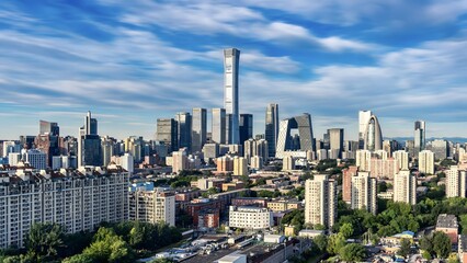 Fototapeta premium Beijing Modern Cityscape with Skyscrapers Under Cloudy Blue Sky - Urban Architecture Skyline