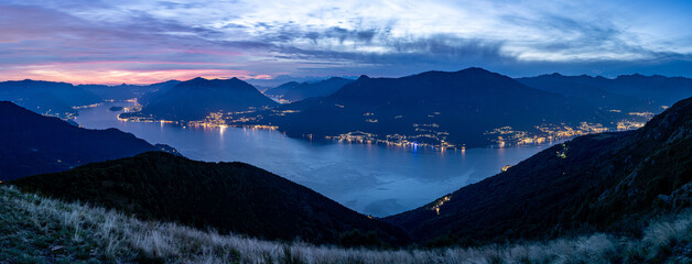 Lake Como panorama, photographed at night from Alpe Giumello, with Bellagio, Tremezzina, Villa Balbianello, and a glimpse of Lake Lugano.