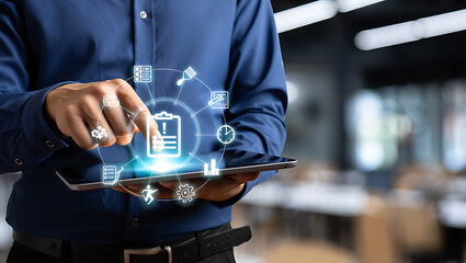 Businessman working with technology on a digital tablet in a modern office