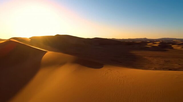 Dramatic desert landscape timelapse revealing shifting sand dunes and long shadows as the sun crosses the sky golden hour, sky, landscape