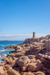 Mean Ruz Lighthouse at Ploumanach on Pink Granite Coast, Perros-Guirec, Brittany, France, Rose Granite Rocks, Blue Ocean, Atlantic Coastline