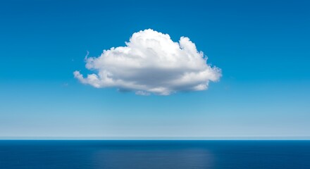 Single white cloud floating above a horizon line on a clear blue sky