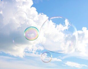 Clear soap bubbles float mid-air against a partly cloudy bright blue sky