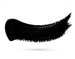 Bold, sweeping black paintbrush stroke with texture on white background