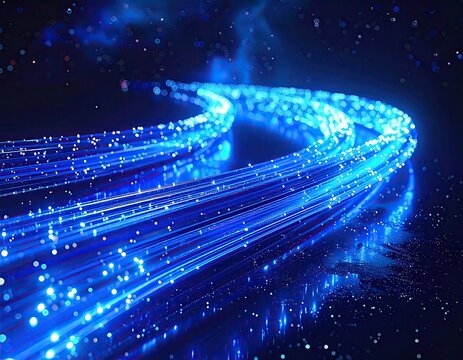 Abstract image showing glowing blue light trails moving diagonally through space