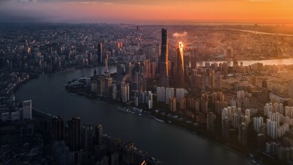 Aerial View of Manhattan Skyline at Golden Hour Sunset Over East River, New York City Drone Photography