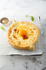 Traditional cheese pie with egg yolk