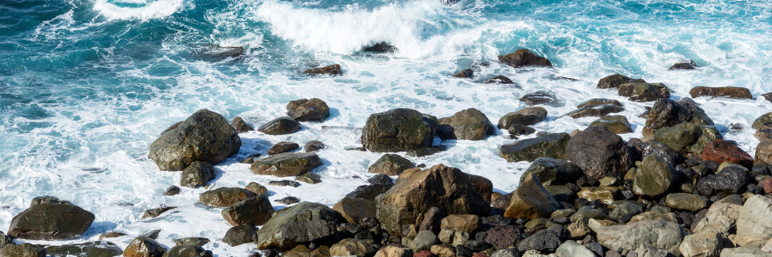 Panoramic image. Waves on the rocky coast - Powered by Adobe