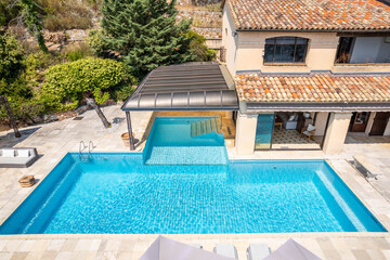 Luxury villa with infinity pool and Mediterranean architecture