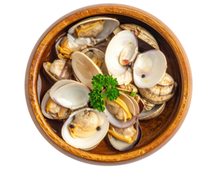 Overhead shot of steamed clams in a wooden bowl, garnished with parsley