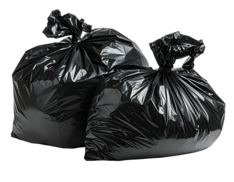 Two tightly knotted black plastic refuse sacks, ready for disposal, studio shot