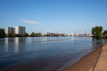 The Neva River near Oktyabrskaya Embankment with a view of the construction of the Bolshoi Smolensky Bridge. St. Petersburg, Russia