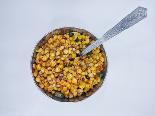 Spicy Pan-Fried Corn Kernels with Green Chiles in a Steel Bowl