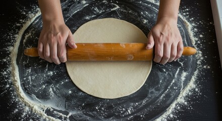 Top View of Hands Rolling Out Homemade Pizza Dough on a Floured Surface