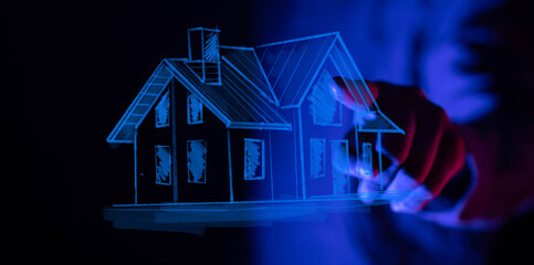 Hand draws house sketch, symbolizing homeownership, real estate, new beginnings, and future plans.