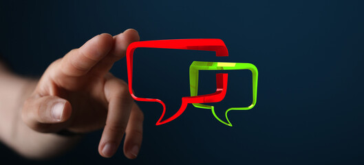 A hand interacts with floating speech bubbles, symbolizing digital communication, online conversations, and interactive dialogue. Ideal for mess