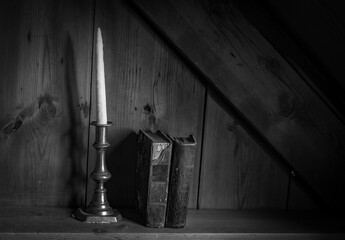 vintage books  and old candlestick with candle
