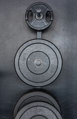 barbell discs in  an athletic gym