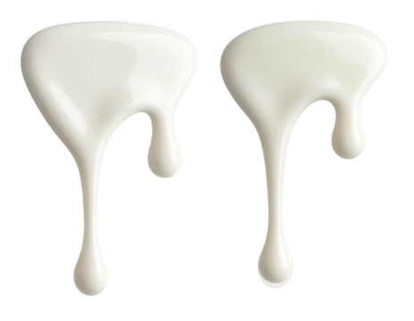 Two streams of creamy white liquid dripping downward on a black background