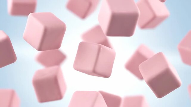 Pink Cubes Floating Against a Blue Background in the Studio