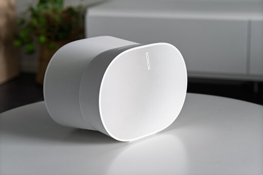 Rusko, Finland - September 25, 2025: White Sonos Era 300 wireless smart speaker on a round table in a Scandinavian-style living room interior.