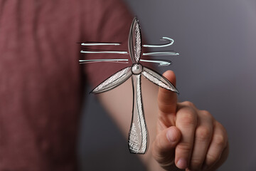 Sketch of wind turbine, hand points. Green energy, sustainability, eco friendly concept. Ideal for websites, blogs, and presentations.