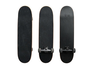 Three skateboards with black decks, various orientations, isolated on a black background