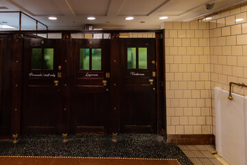 Obraz premium Copenhagen, Denmark 07-20-2025 The public toilets under the central square Amagertorv in downtown Copenhagen with a very authentic and historical look and feel
